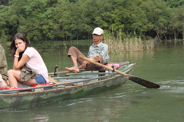 Local boat rower using his feet