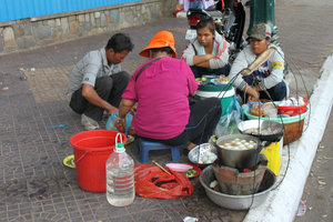Selling eggs by the Mekong river