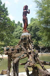 Wooden statue at Yang Bay park