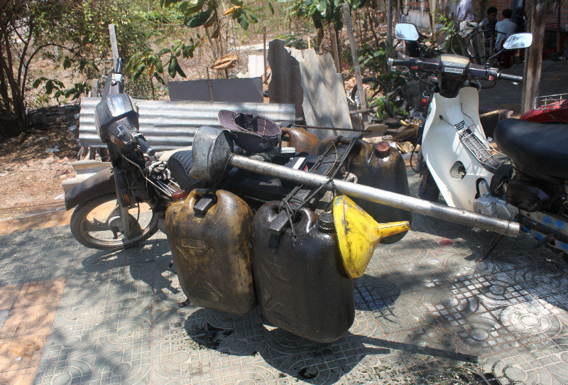 A bike with cans of gasoline in Vũng Tàu city