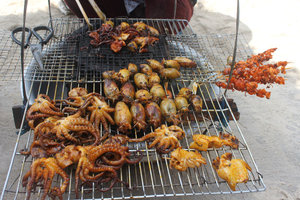 Grilled squids at a beach in Long Hải town