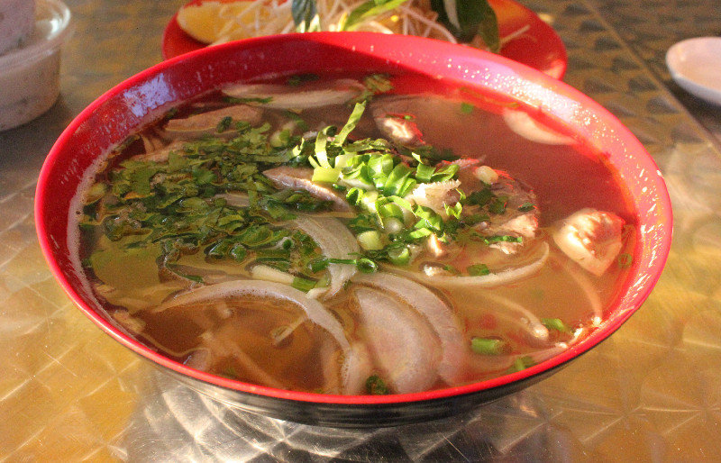 Phở bò (beef noodle soup) at a restaurant