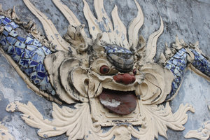 Dragon on a wall at Cửa Ông temple