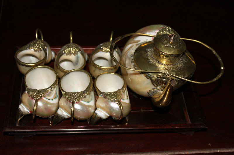 Tea pot and cups made from sea shells