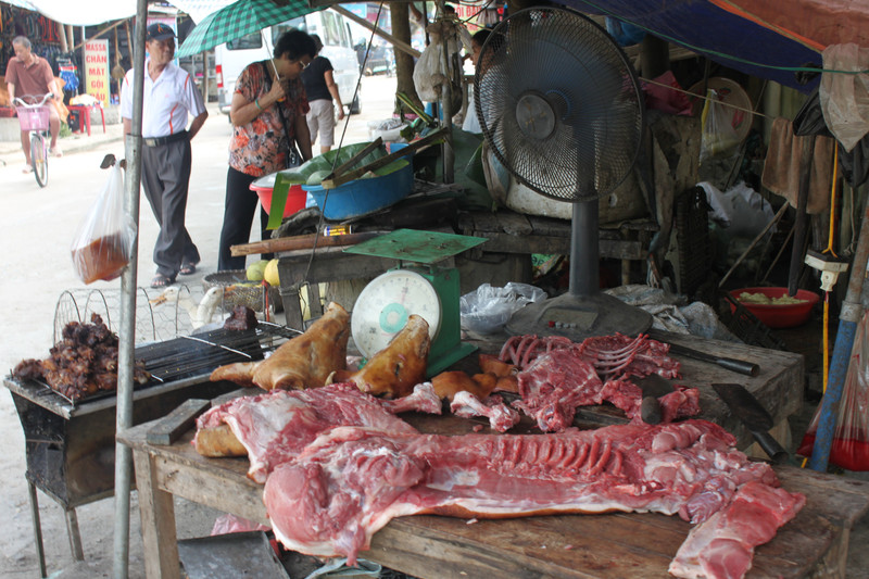 Grilled pork sold at a market outside the hot spring