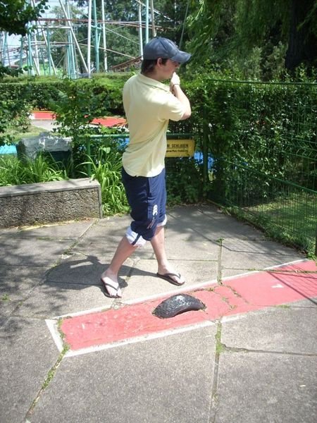 James Playing Mini-Golf