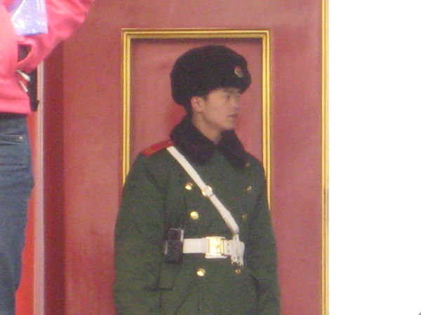A guard helping to keep China happy and harmonious