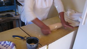 Lady making sopaipillas