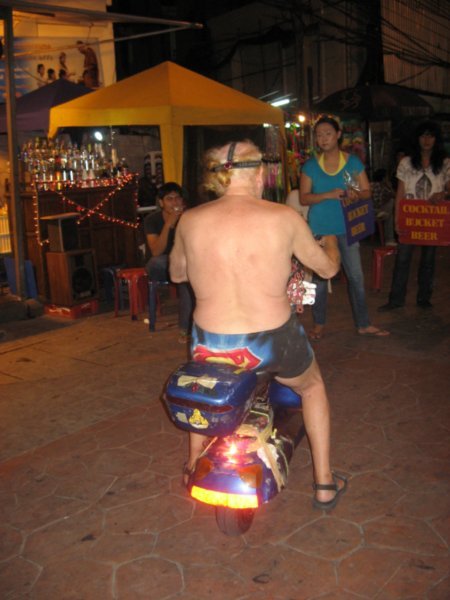 Mr Superman on his scooter - Khao San road