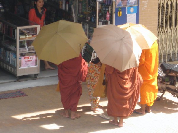 Monks receiving their daily offerings