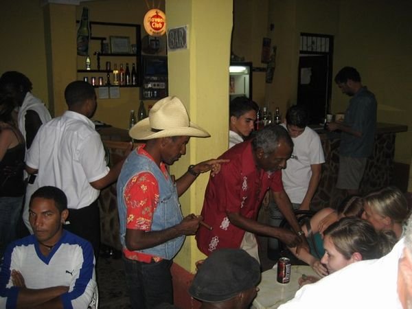 Cuban dancers hustling the young foreigners
