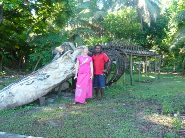 Michelle at the whale bones in the Fijian Village on Vorovoro