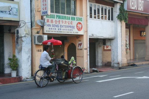 Cyclo-pousse dans les rues de Georgetown