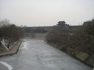 City wall and icy river