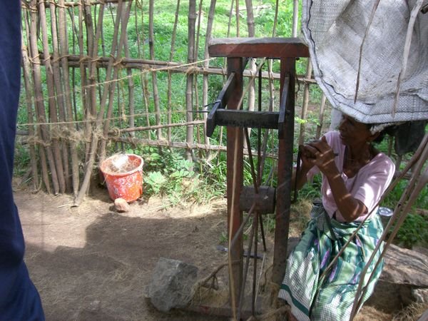 Lady making coconut fibre rope