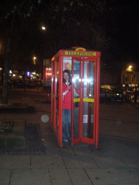 colleen in a telephone booth