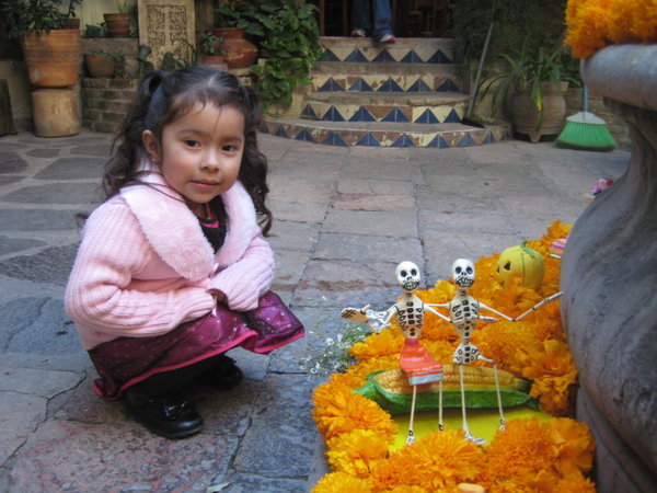 Little Girl Looking at Skeletons
