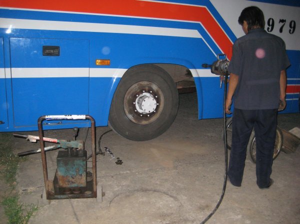 Changing a flat on the bus on the way down to Prachuap