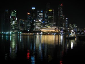 Singapore skyline at night.  Reminds me of the SD skyline.