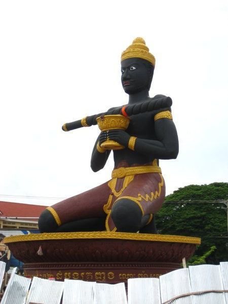 The statue with the Battambang stick at the entrance of the city