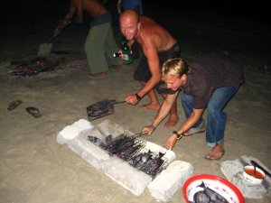 Cooking up some fish BBQ on the beach