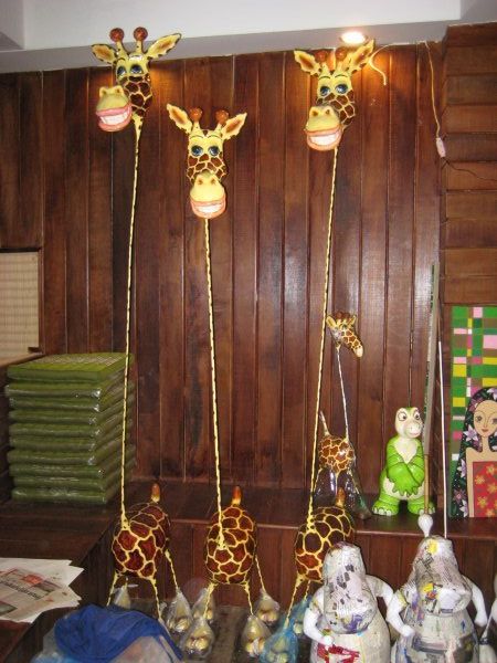 Cool sculptures of paper machete giraffes