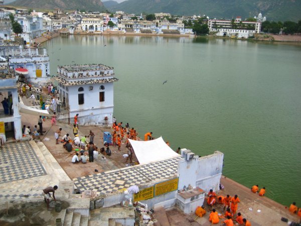 Pilgrims bathing at the holy ghat in Pushkar