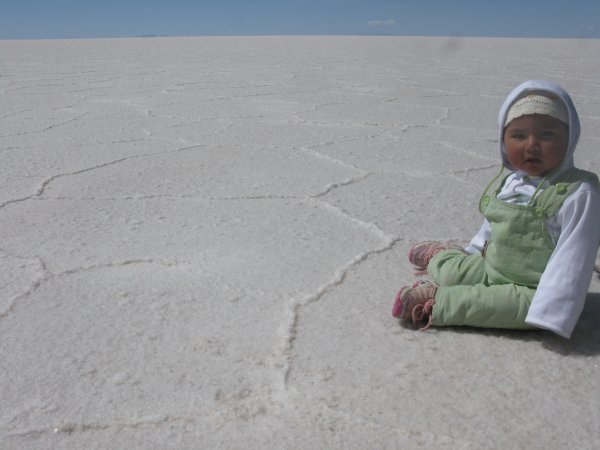 Our baby guide in front of infinity at the Salar de Uyuni