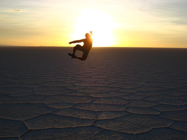 Francisco jumping at the Salar de Uyuni, Bolivia