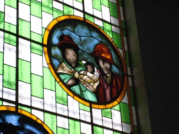 Notice the depiction of miners on the stained glass in The Virgin of Socavon Church