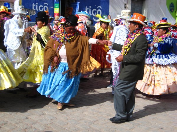Typical Bolivians dancing after Carnaval in Copacabana, Bolivia