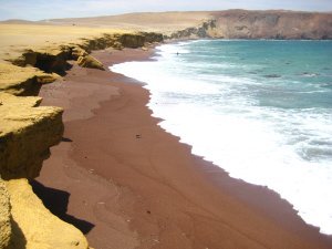 Red sand on the beach in Peru (Pacific Ocean)