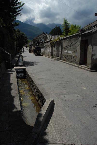 Dali vertical street with water stream