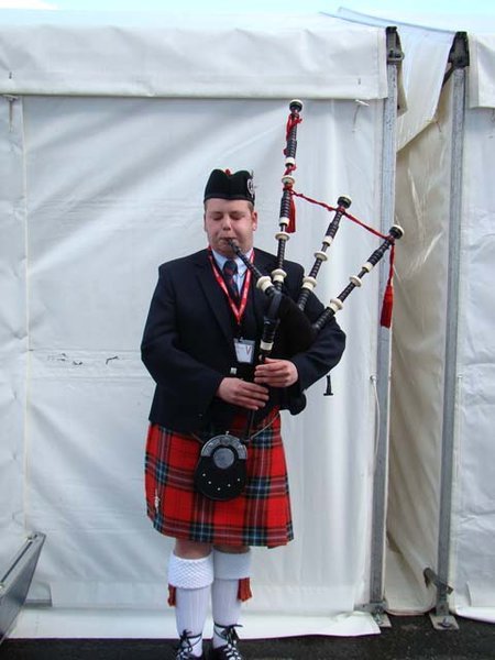 Scotsman Playing Bagpipes