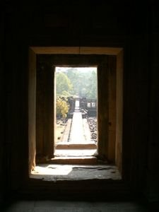 Looking out of a doorway of a temple