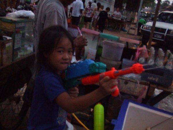 Little girl and her pistol