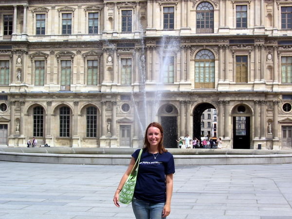 me and a fountain at the Louvre
