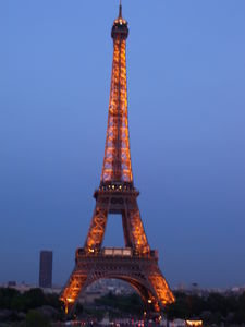 the Eiffel Tower starting to be lit up
