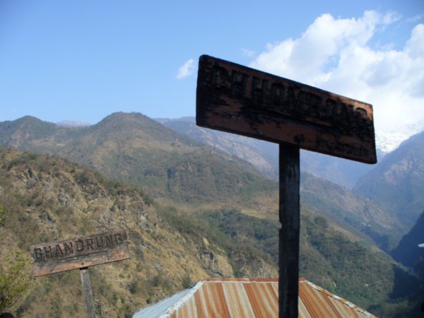 Signs pointing to Everest base camp or to Ghandrung