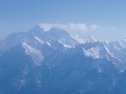 Everest is on the left with snow blowing off
