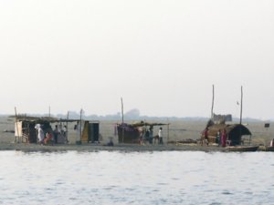 Homes across the river from the bathing ghats at Varanasi
