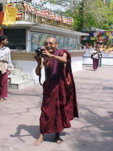 Monk taking photos