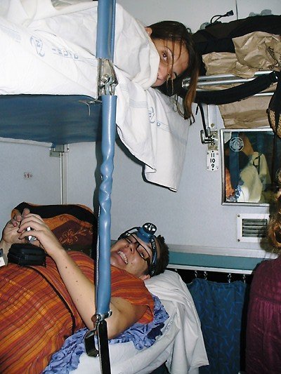 Harriet and Sammy settle down in their bunks on the sleeper train to Delhi