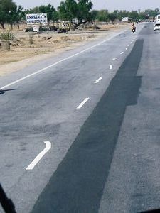 Drunken white line painting on the road to Pushkar!