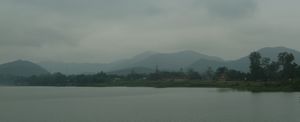 Misty mountain view on our boat trip on the Perfume River, Hue
