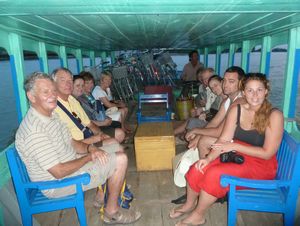 Tired but happy on the boat trip back to Hoi An