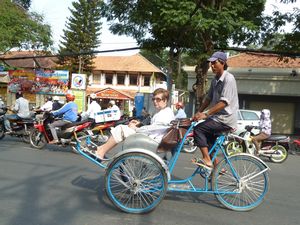 Bet looking a bit apprehensive on the cyclo ride through HCMC