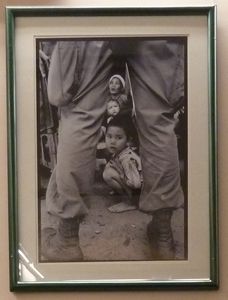 Children framed by US soldiers legs