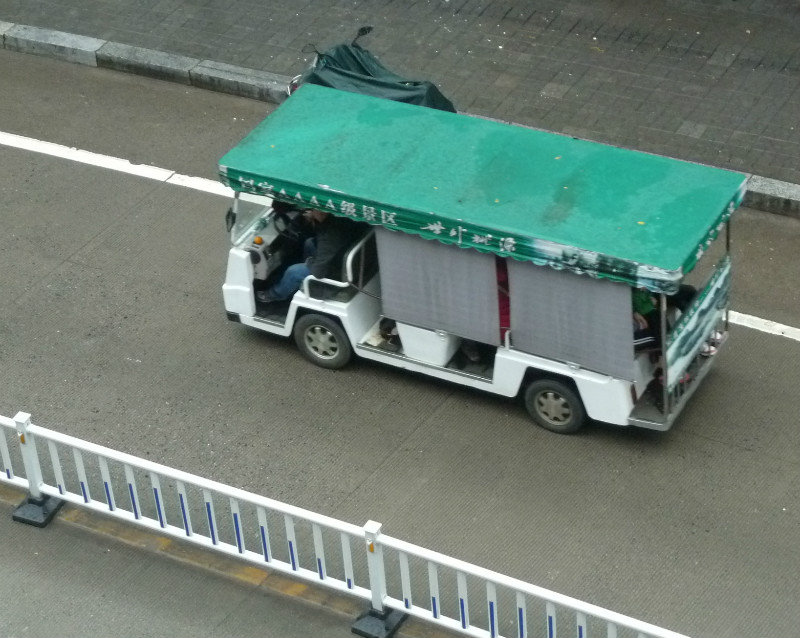 Strange vehicles seen from our hotel room in Yangshuo
