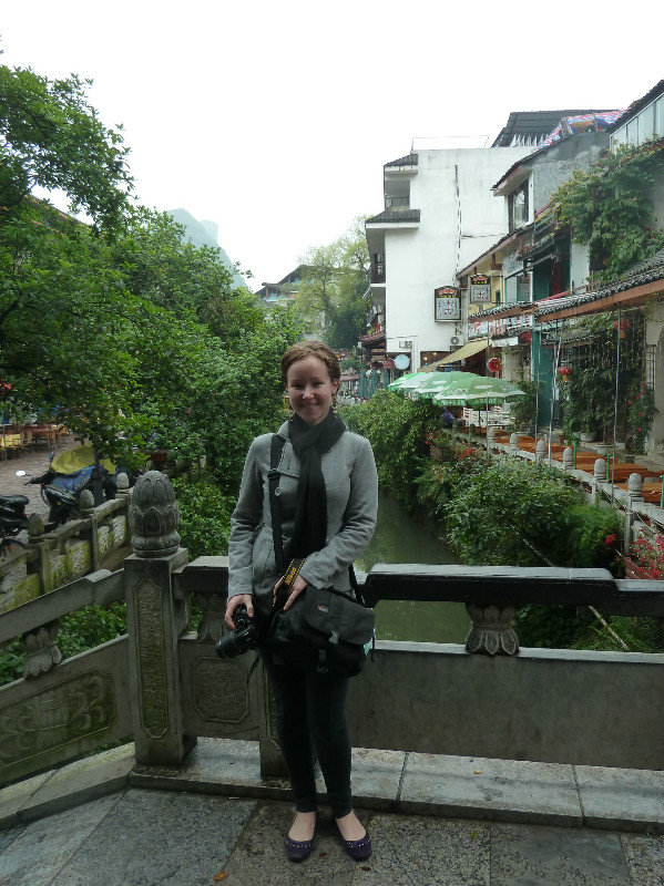 Renee posing on a pretty little bridge in Yangshuo